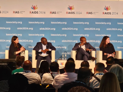 AIDS 2024 Roche Symposium: From left Dr. Lara Vojnov (Global Health Impact Group), Dr. Jared Mecha (University of Nairobi), Dr. Herry Mapesi (Roche Diagnostics), Dr. Heather Alexander (CDC International Lab Branch) and Ben Plumley (Shot In The Arm Podcast).