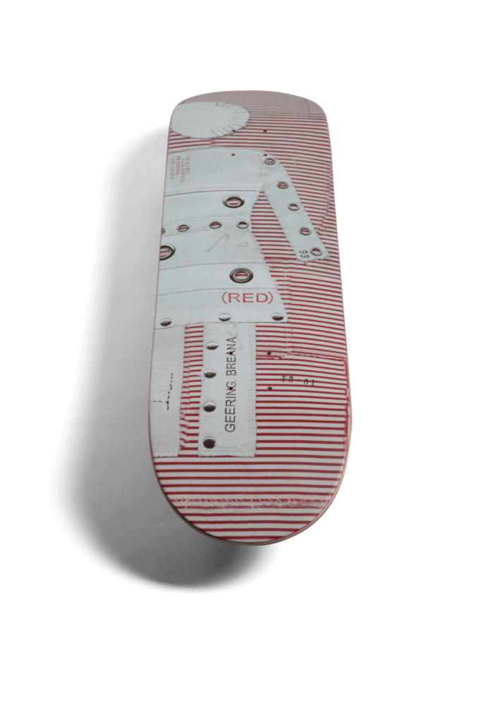 Underside of (GIRL)ᴿᴱᴰ Geering Stripe Deck: features a patchwork Girl Skateboards logo on a red and white striped backdrop.